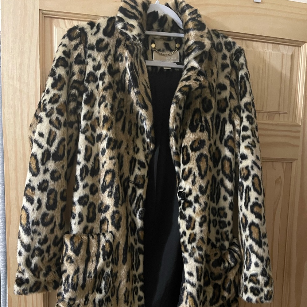 Leopard Coat just above the knee. Brand new! Never worn